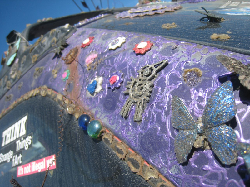 Illustration for article titled Groovalicious Purple Princess Of Peace Art Car Falls On Hard Times, Faces Crusher